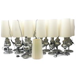 fourteen chrome table lamps with cream fabric shades, H79.5cm