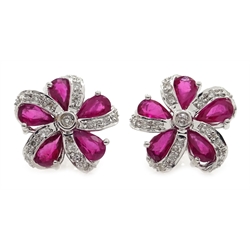  Pair of white gold ruby and diamond stud earrings, hallmarked 18ct  