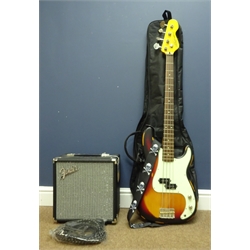  'Vintage Icon Series' bass guitar with distressed style finish, with soft case and a Fender Rumble 15 bass amp, new with tags   