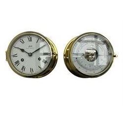 Eight-day 20th century brass cased “Schatz Royal Mariner” bulkhead clock, with a 6” dial, Roman numerals and minute track, bells on/off control, black spade hands with a brass bezel and flat bevelled glass, twin train spring driven balance wheel movement sounding the ships watches on a bell.
With a corresponding and matching Schatz open dial compensated aneroid barometer, with weather predictions and measuring barometric pressure in inches and millibars, with a curved spirit thermometer measuring temperature in Fahrenheit and Celsius, steel indicating hand and brass recording hand.
