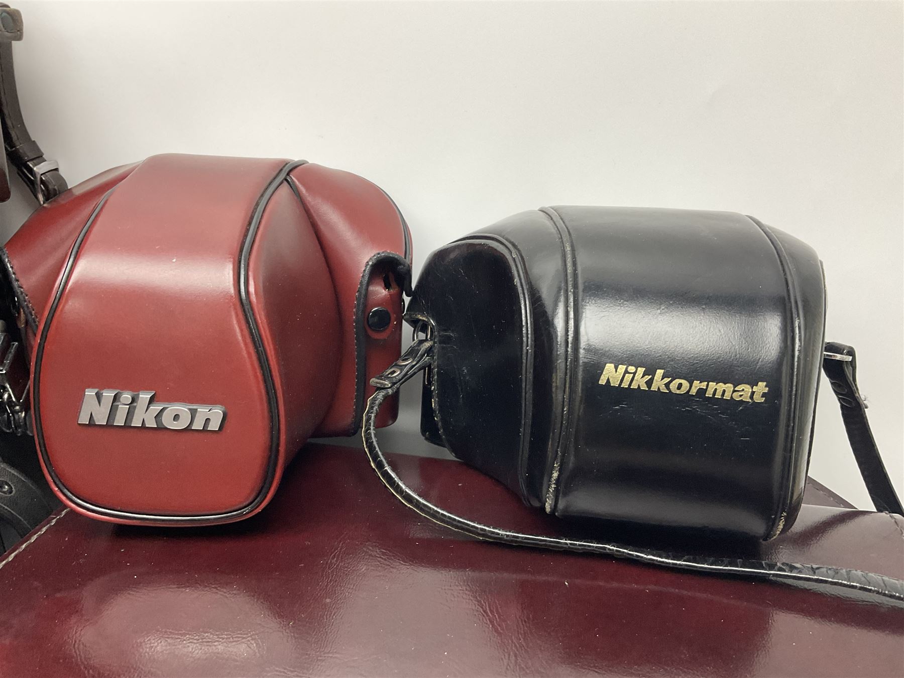 Collection of leather camera cases, to include Nikon ever ready cases and two larger cases, together with Gossen Sixticolor light meter, in box and other camera equipment 