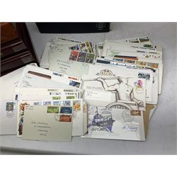 Mostly first day covers, some with printed addresses and special postmarks, 'Kew Gardens', 'Europa 1990', 'RSPCA', 'Christmas 1990' etc, housed in five folders and loose