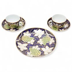 Pair of Newhall teacups and saucers, with matching plate, in pattern no 779, painted with ...