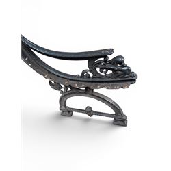 Yates Haywood - pair of 19th century cast iron bench ends, winged griffin detail, arched legs with rope turned decoration, finish in green paint, registration number 206550, first registered 8 March 1867 (see illustration), length as required