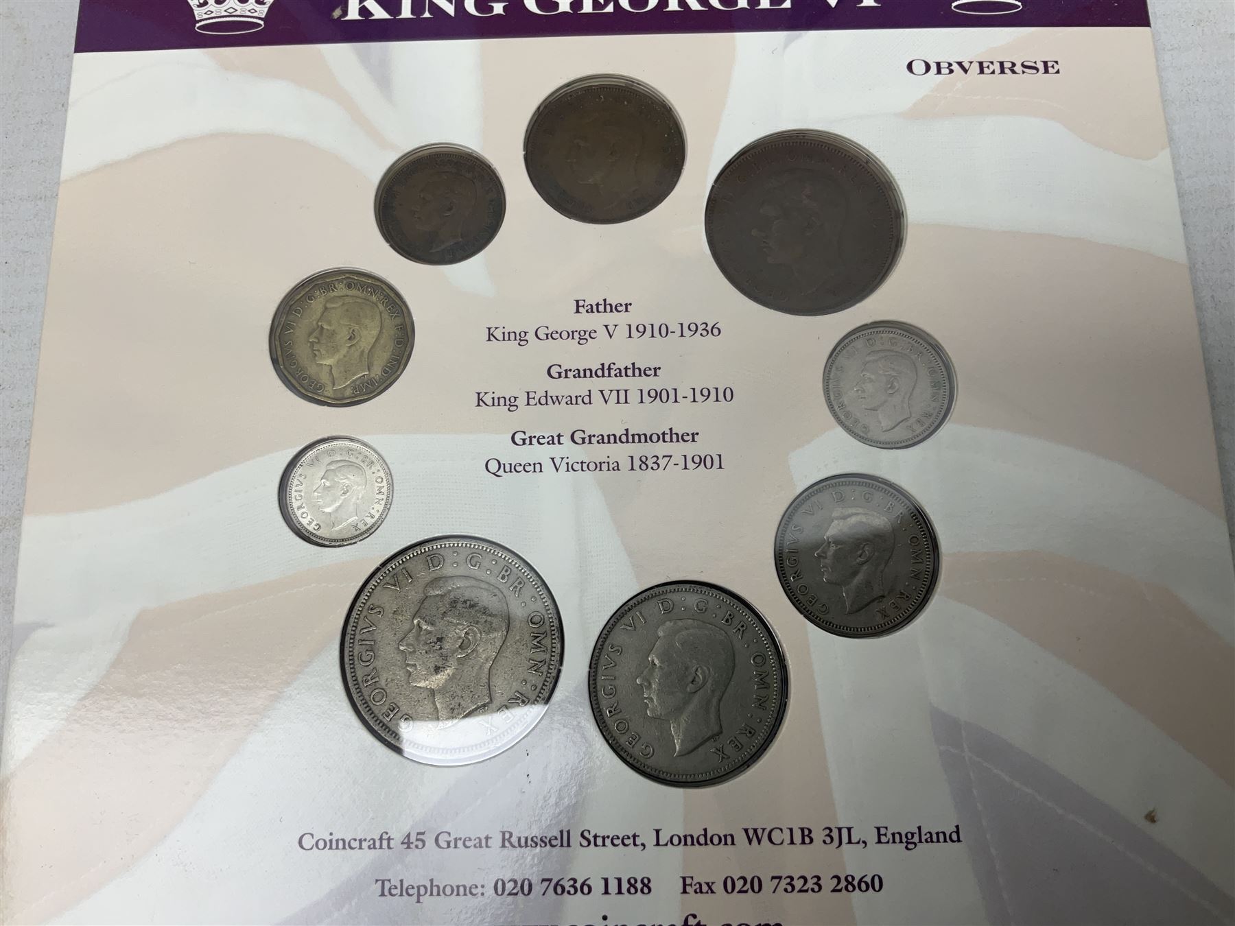 Coins and sets, including Great Britain and Northern Ireland 1970 proof coin collection in card folder, Queen Elizabeth II 2021 'Through the Looking Glass' five pounds, 2021 'Winnie the Pooh' fifty pence, Queen Victoria 1887 halfcrown, King George V 1914 halfcrown, commemorative coins, The Royal Mint Solomon Islands 2003 twenty-five dollars silver proof coin cased with certificate, 9ct gold half sovereign mount etc