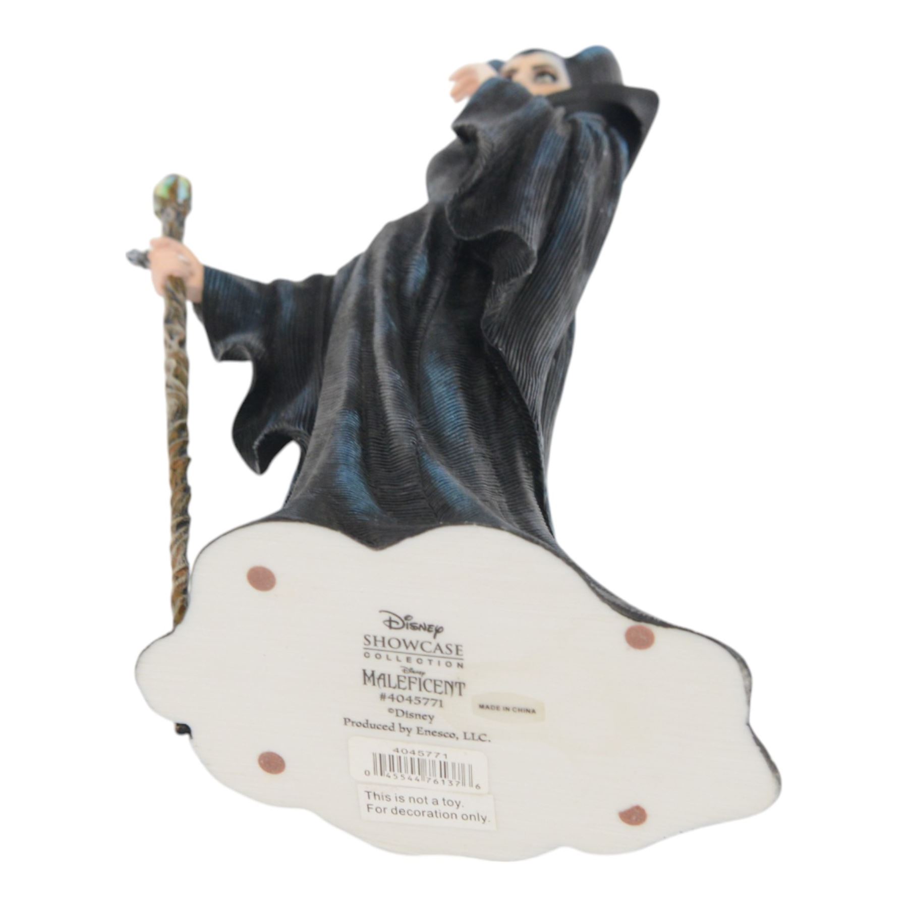 Disney Showcase Haute Couture figures, comprising Evil Queen, Cruella Devil and two Malificent, all boxed