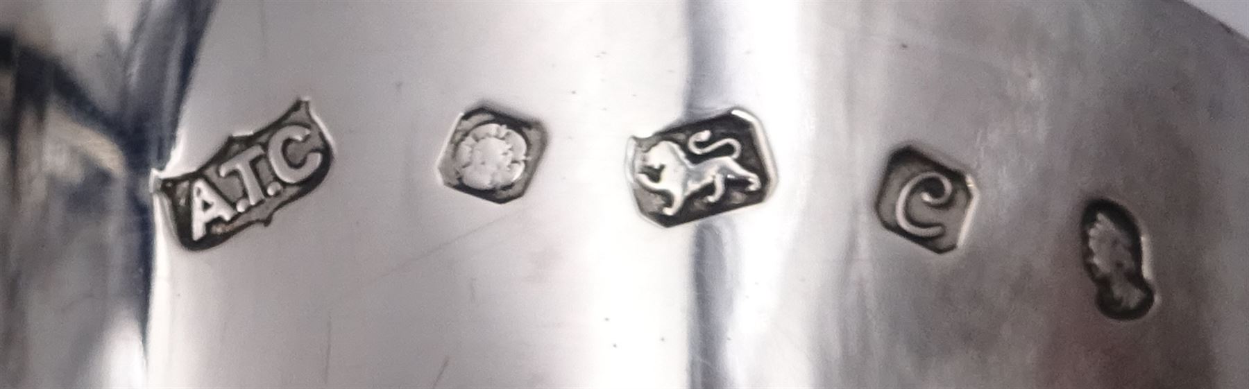 Modern limited edition silver goblet, commemorating Queen Elizabeth II silver jubilee, of plain form with gilded interior, applied Royal coat of arms to body and engraved 'The Queen's Silver Jubilee 1952-1977' upon knopped stem and circular spreading foot, limited edition no. 320/1000, hallmarked A T Cannon Ltd, Sheffield 1977, boxed with certificate, goblet H12.8cm