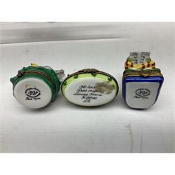 Group of Limoges trinket boxes, to include a number of novelty examples, including examples modelled as Noah's ark, shotgun case containing shotguns, picnic basket containing food, toad reading book seated upon a lily pad, etc., (9)