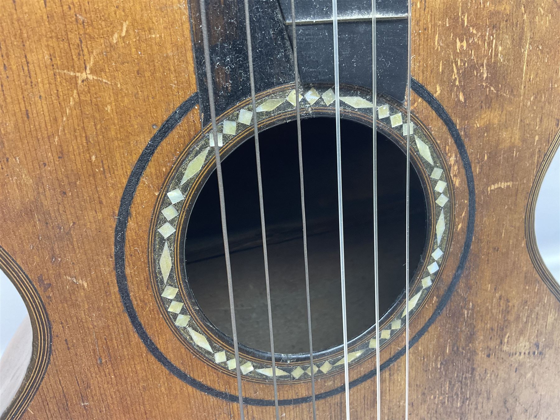 19th century Continental parlour guitar for restoration or display, with maple back and sides,  spruce top, scalloped neck and bone pegs; bears inset plaque to head 'Lapaix Paris 1830' and 'John Eastwood Teacher of the Guitar' paper label with manuscript note 'Fine Old Guitar Restored 1888 by JCB Leeds' L92cm