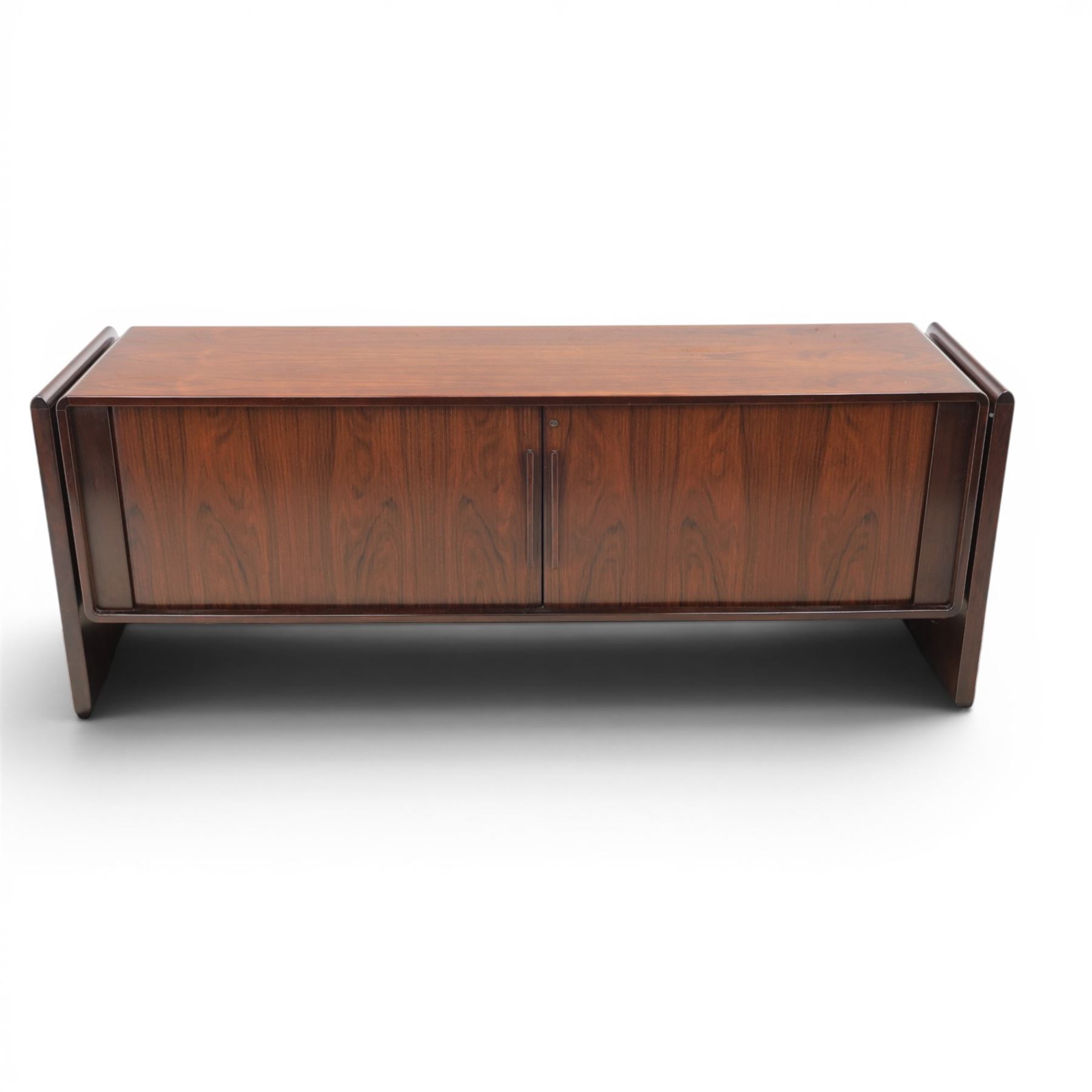 Dyrlund - contemporary Santos rosewood office sideboard of minimalist form with clean lines, rectangular top with integrated side supports, left side with two drawers, and right side with a filing drawer, all enclosed by tambour sliding doors