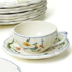 Gien France faience tea and dinner service in the 'Oiseaux de Paradis' pattern comprising six dinner plates, eight dessert plates, eight soup bowls, four cups, six saucers, oval plate, milk jug and sugar bowl and cover