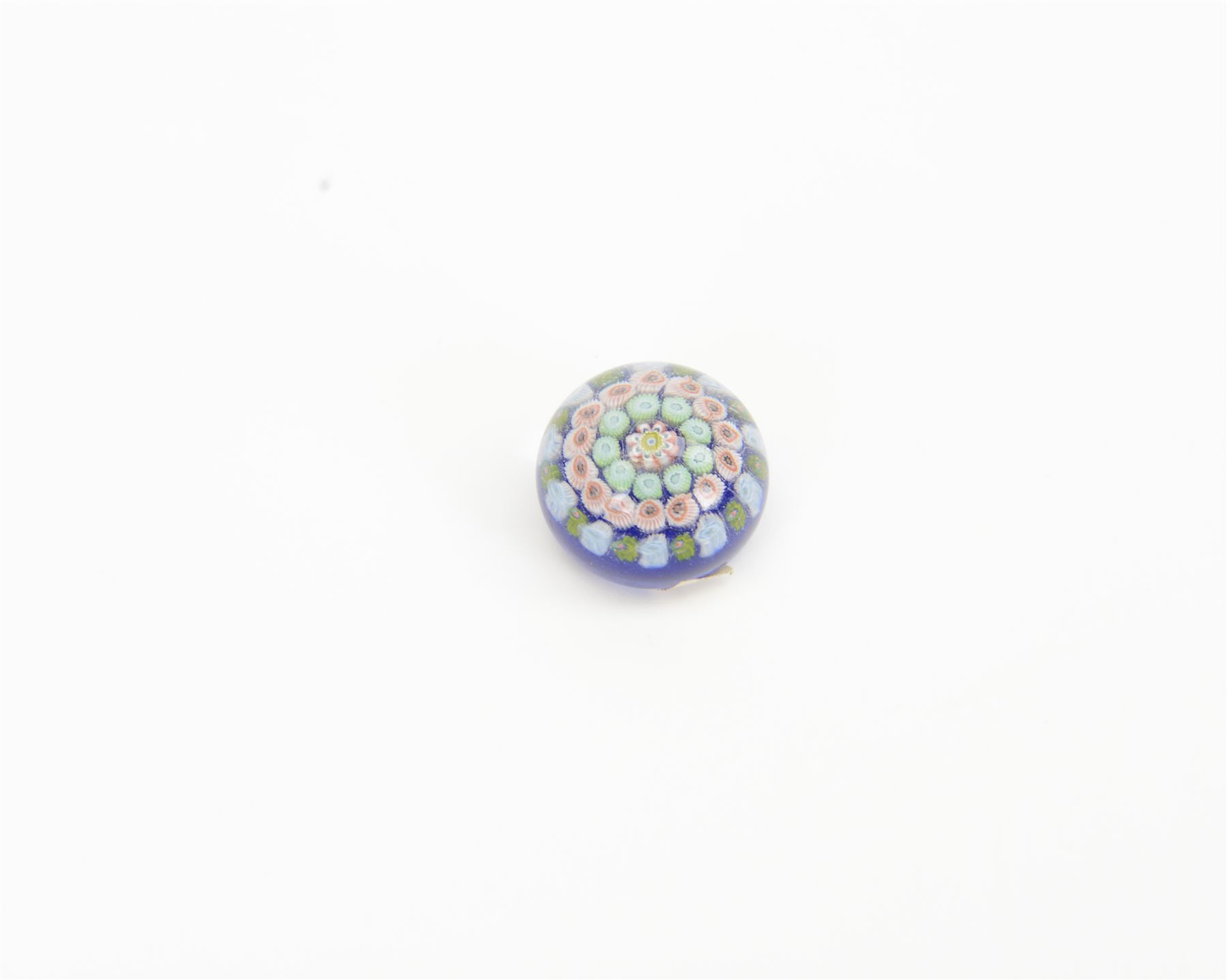 Nine miniature milleifiori paperweights including an example with twisted canes 