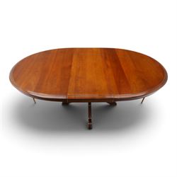 Barker & Stonehouse - cherrywood oval extending dining table and four upholstered chairs, the table with additional leaf extended to cm, raised on a turned column above swept supports, the chairs with brown upholstery and multi-coloured geometric design