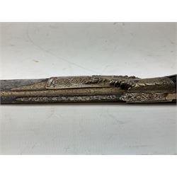 19th century Singhalese knife pia kaetta, the 20cm steel blade inset with yellow and white metal, with metal mounted carved pistol grip, in plain wooden scabbard L33cm overall