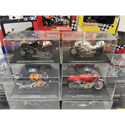 Fifty-one die-cast models of motorcycles by Maisto, Protar Italeri, Welly etc; many in perspex display boxes, some in window boxes and some unboxed