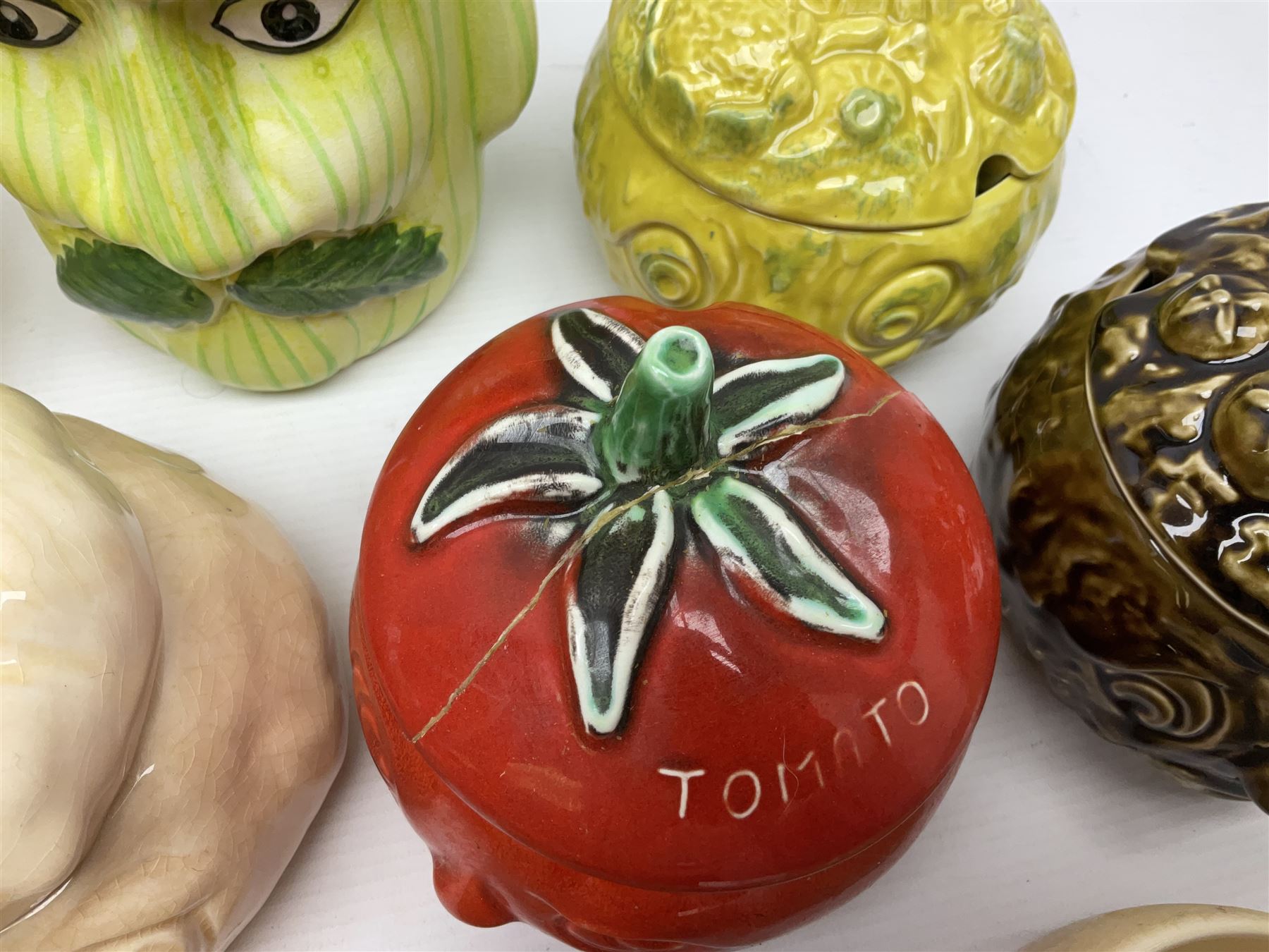 Collection of mostly Sylvac kitchen storage jar face pots, including piccalilli, chutney, tomato and bread sauce, tallest H15.5cm