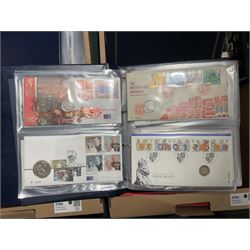 Approximately one hundred and fifteen Royal Mint coin covers, in two ring binder folders and loose, together with approximately 53 grams of Great British pre-1920 and approximately 68 grams of Great British pre-1947 silver threepence coins, and a small quantity of further pre-decimal coins