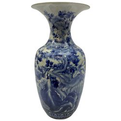 Oriental blue and white vase, of slender ovoid form with waisted neck and flared rim, decorated with cranes by waters edge and further detailed with flowers, H38.5cm
