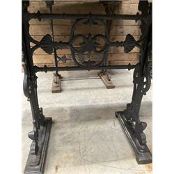 Four cast iron pub or bar tables with rectangular tops
