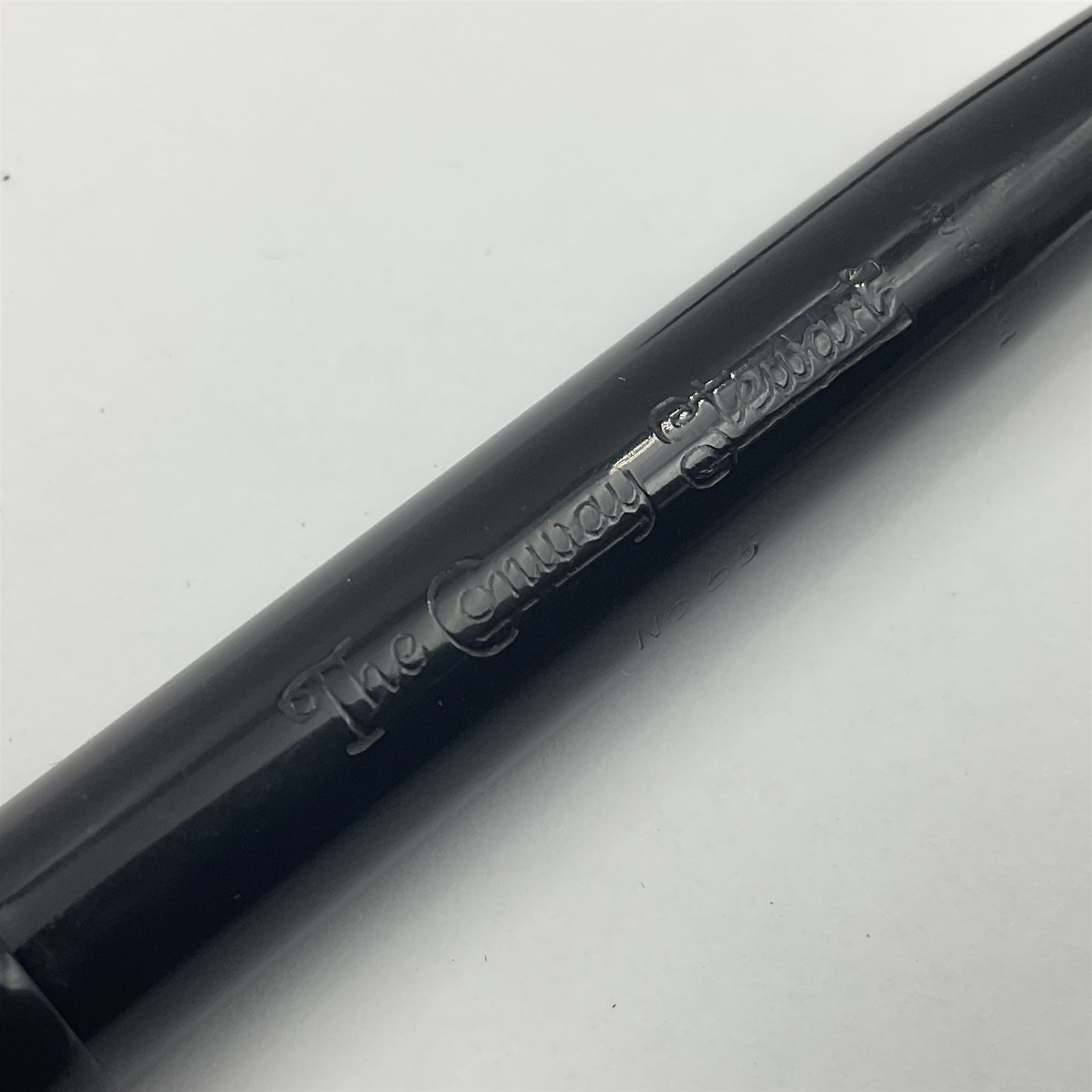 Three Conway Stewart fountain pens, comprising Cracked Ice 28 pen, the black and pearl white barrel engraved Conway Stewart 28 and double banded cap, with gold nib stamped 14ct, together with a Conway Stewart 75 lever fill pen, the green marble barrel and cap with single band and gold nib stamped 14ct and Conway Stewart 55 lever fill fountain pen with black barrel and cap with single broad band and two narrow bands with gold nib stamped Duro 14ct, largest L13cm