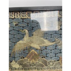 Early 20th century Chinese silk work tapestry, depicting a crane flying over a river, H30cm 