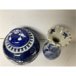 20th century Oriental blue and white ceramics, to include three ginger jars and one urn with cover, all decorated with prunus blossom on a blue ground, each with printed concentric circles mark beneath, together with a collection of similar Oriental blue and white ceramics, tallest H16.5cm