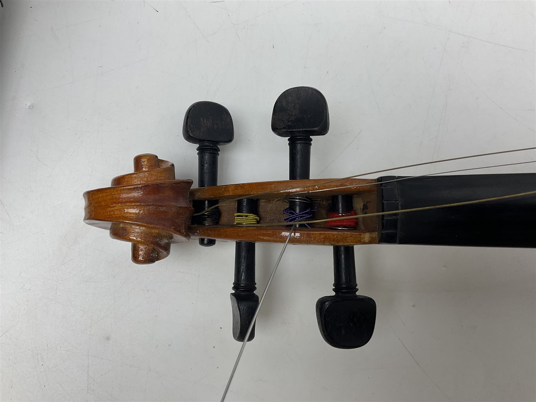 Four student violins - two Chinese three-quarter size with 33.5cm and 34cm two-piece backs; Stringers of Edinburgh quarter size with 28cm two-piece back; and Stentor quarter size with 28cm two-piece back; each in carrying case (4)