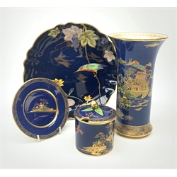 Three pieces of Carlton Ware, comprising a lobed dish decorated with a kingfisher and lilies, D23cm, a Mikado pattern vase, and a Mikado pattern preserve jar, with accompanying stand.