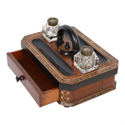 Tunbridge desk stand, with ebonised handle, twin inkwells with Thomas Morton 'The Maze' closing lids, with draw to the front 