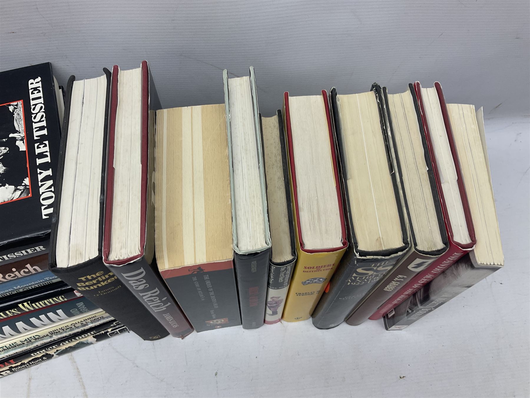 Twenty-six books of WW2 German interest with particular emphasis on the 'SS', including Charles Sydnor: Soldiers of Destruction; G.S. Graber: History of the 'SS'; Bruce Quarrie: Hitler's Samurai; David Cesarini: Eichmann - His Life and Crimes; collector's reference books etc (26)