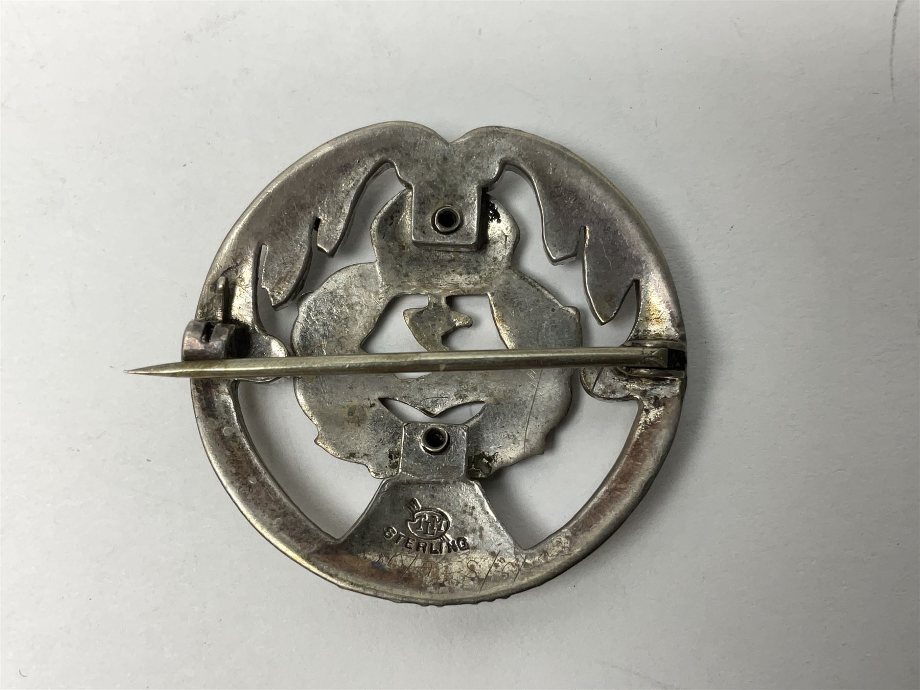Five silver sweetheart brooches - Royal Artillery with marcasite, Naval with marcasite, George VI Royal Engineers with tortoiseshell, Royal Marines Gibraltar with enamel and South African General Service with blue enamel (5)