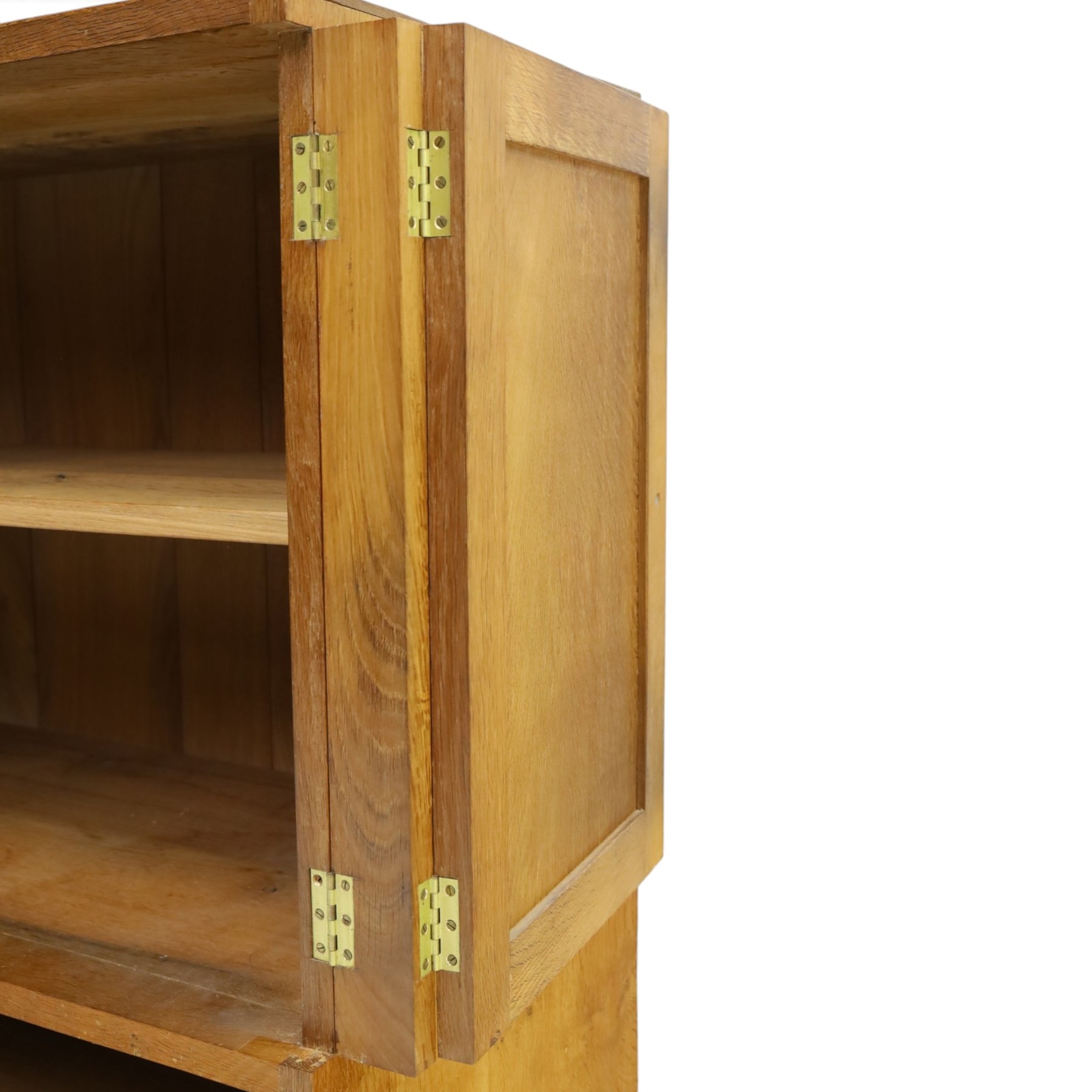 Lizardman - adzed oak media cabinet, adzed rectangular top above twin doors enclosing a shelved interior, above a fall front drawer, Yorkshire Rose carved handles, raised on castors, with carved lizard signature, by Derek Slater of Crayke  