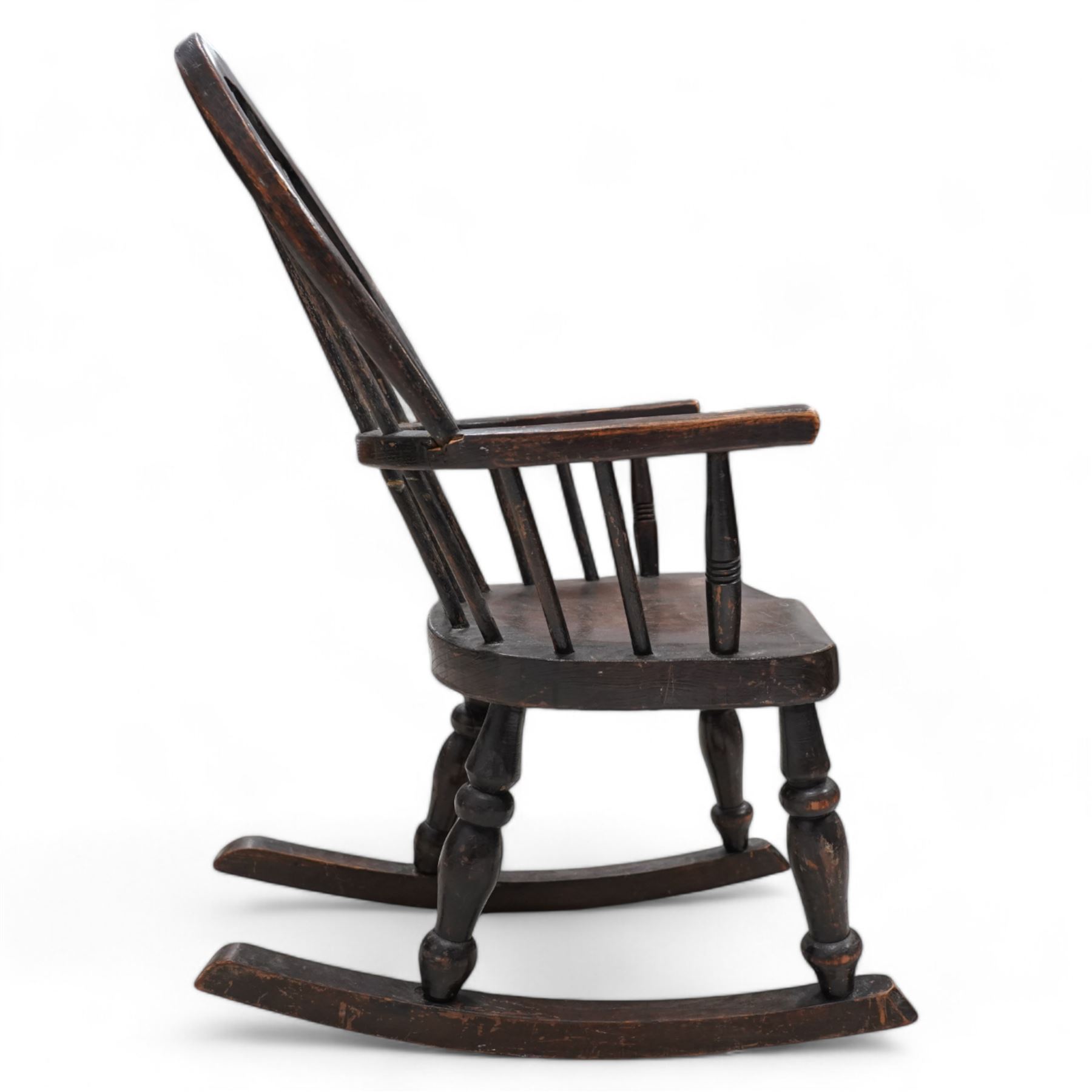 19th century child's Windsor rocking chair, double hoop and stick back, dish seat on turned supports united by rockers 