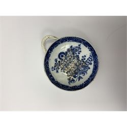 Late 18th/early 19th century Leeds Pottery egg drainer, the pierced bowl of circular form decorated with blue transfer printed floral spray and floral border, the twisted handle with foliate mounts, bowl D9cm