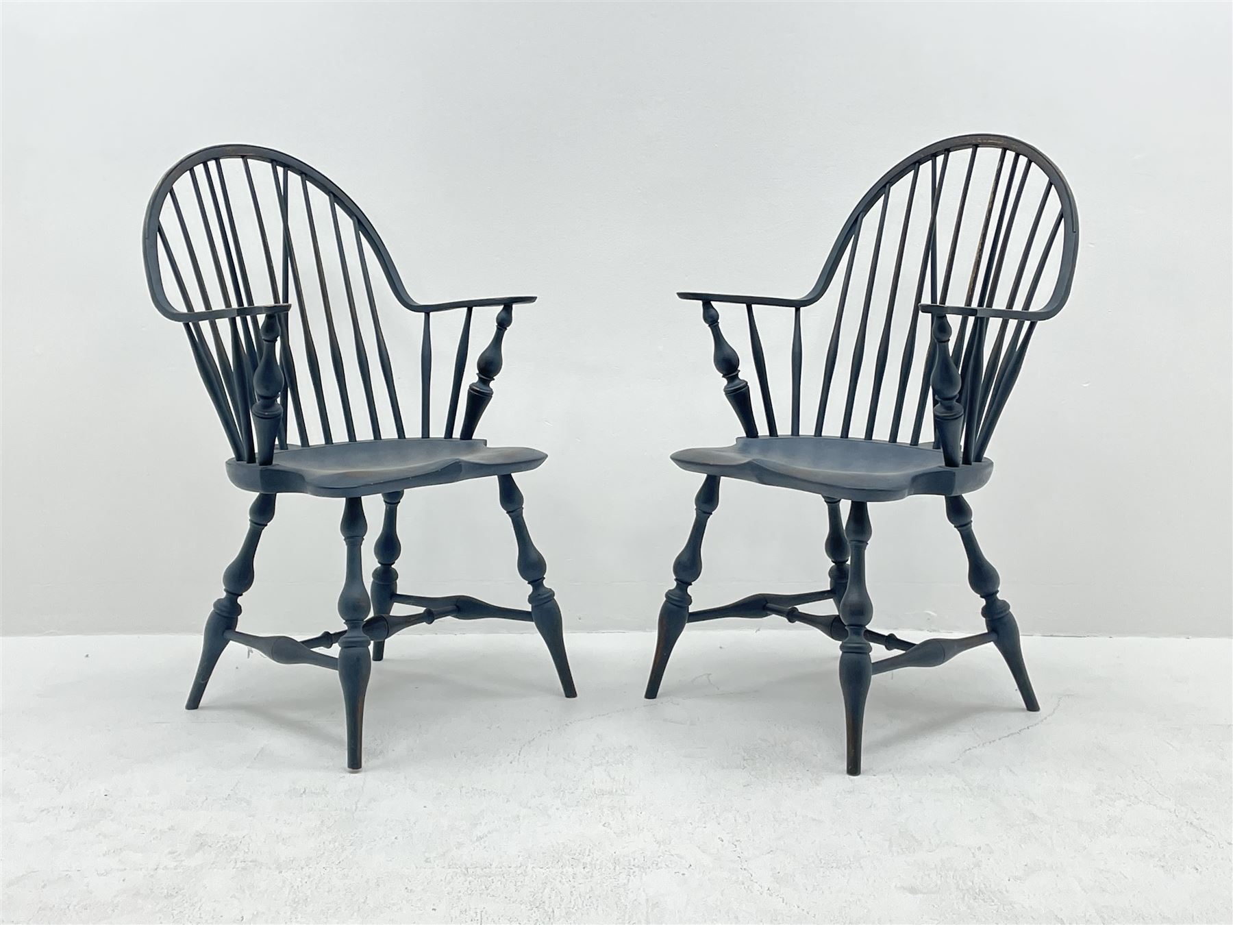 D.R. Dimes Furniture - set six American Windsor dining chairs, hoop and stick back on dished saddle seats, turned supports jointed by H stretchers, stamped underneath 'D.R.Dimes', two carvers and four side chairs