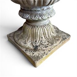 Cast stone tulip urn, petal rim with bell shaped bowl on squat base, stamped HGC; with associated plinth (2)