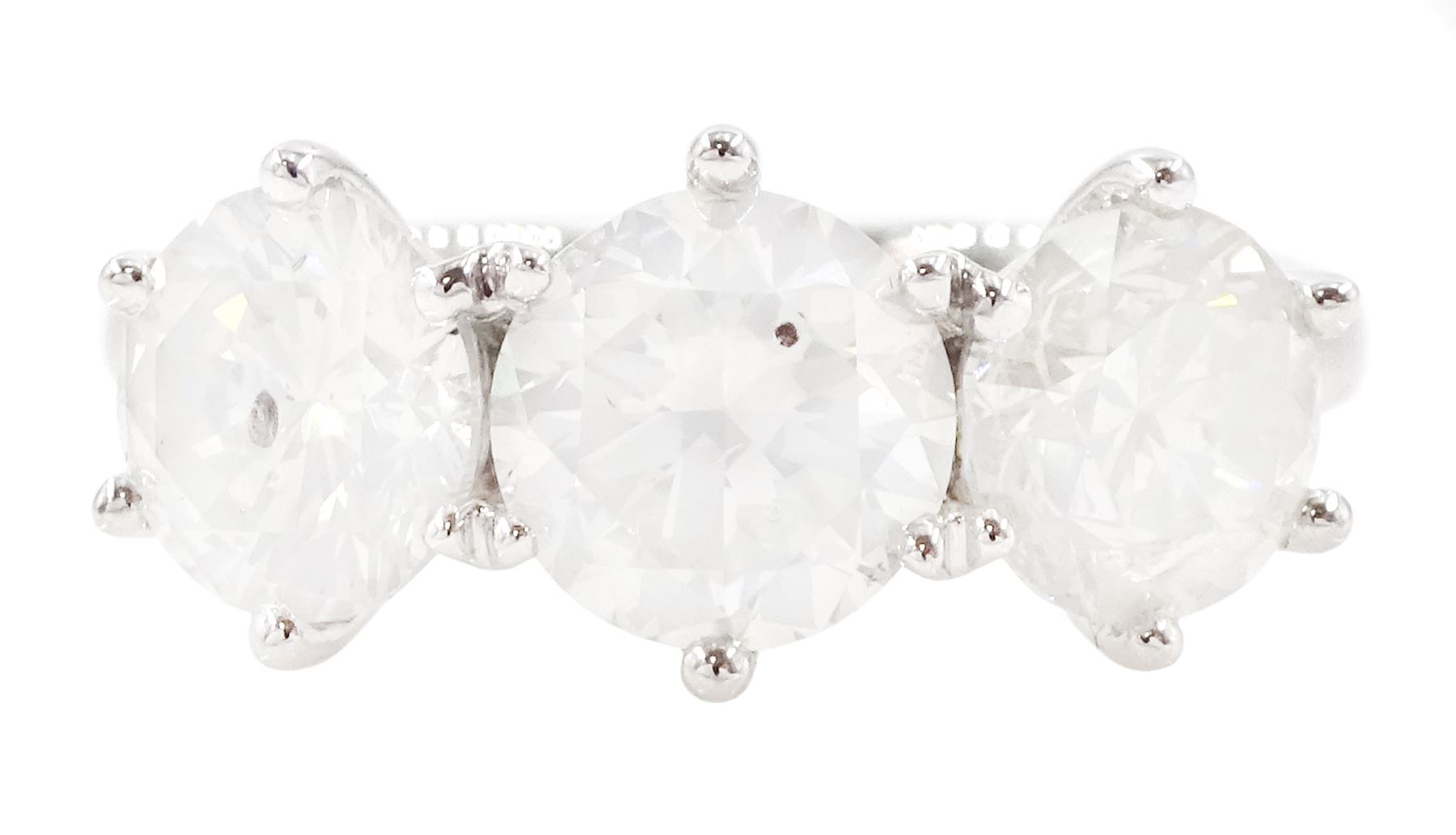 Platinum diamond ring, set with three round brilliant cut diamonds, hallmarked, total diamond weight approx 3.25 carat