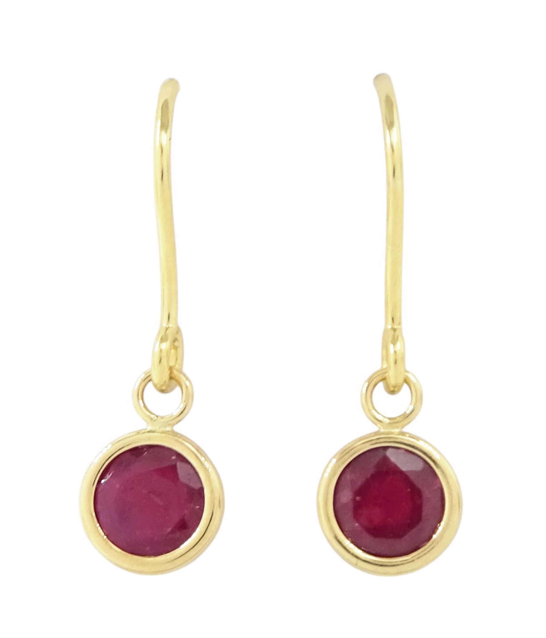Pair of 9ct gold ruby pendant earrings, stamped 375