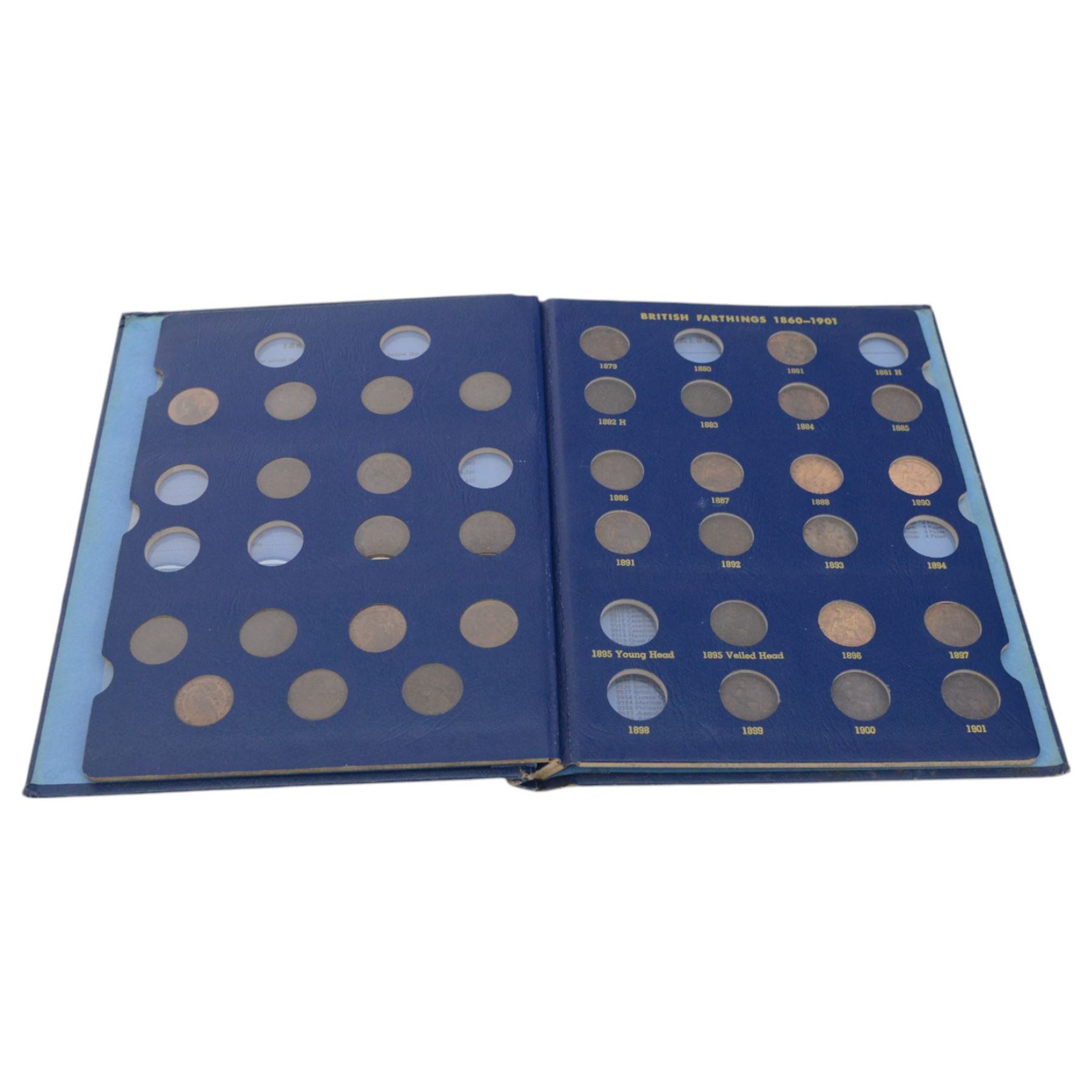 Thirty-four Queen Victoria farthing coins, dated 1860 beaded boarder, 1860 toothed border, 1861, 1862, 1864, 1865/2, 1866, 1867, 1872, 1873, 1874H, 1875, 1875H, 1876H, 1878, 1879, 1881, 1882H, 1883, 1884, 1885, 1886, 1887, 1888, 1890, 1891, 1892, 1893, 1895 Veiled Head, 1896, 1897, 1899, 1900 and 1901, housed in a blue 'British Farthings 1960-1901' Whitman folder