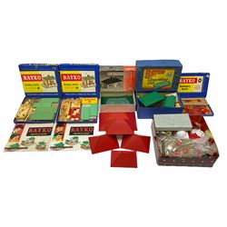 Bayko - quantity of building sections, graduated roofs etc, loose and in boxes No.2x (Converting Set), two x No.11 (Building Set) and No.11c (Accessory Outfit); together with an unmade Playtown Bungalow building construction kit, boxed with instructions