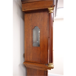  Early 19th century mahogany banded oak longcase clock, 33cm circular silvered Roman dial with Arabic five minute divisions, inscribed Kidd Malton, pagoda top hood with inlaid spandrels, turned columns and finials, 30 hour movement striking the hours on a bell, H210cm   