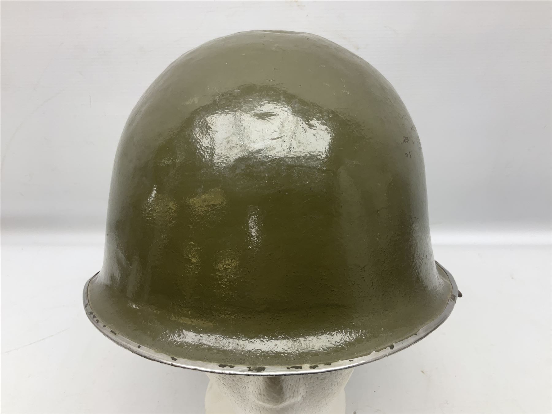 1950s French Algerian War steel helmet with liner; indistinctly marked 'S.I.A. LE EANS(?) 71R'