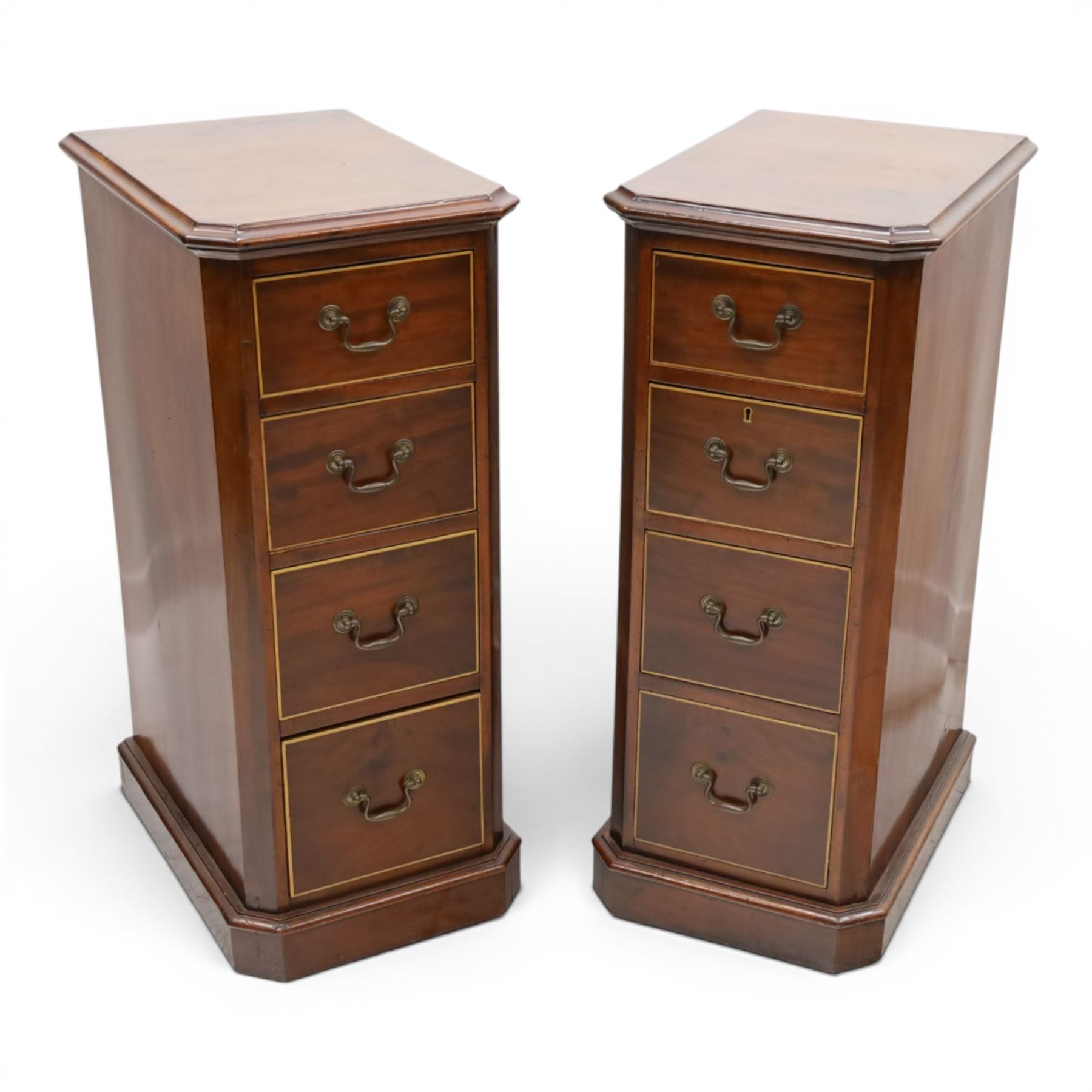 Pair of Edwardian mahogany pedestal chests, of moulded rectangular form, above four graduated drawers, brass swan neck handles, moulded plinth base