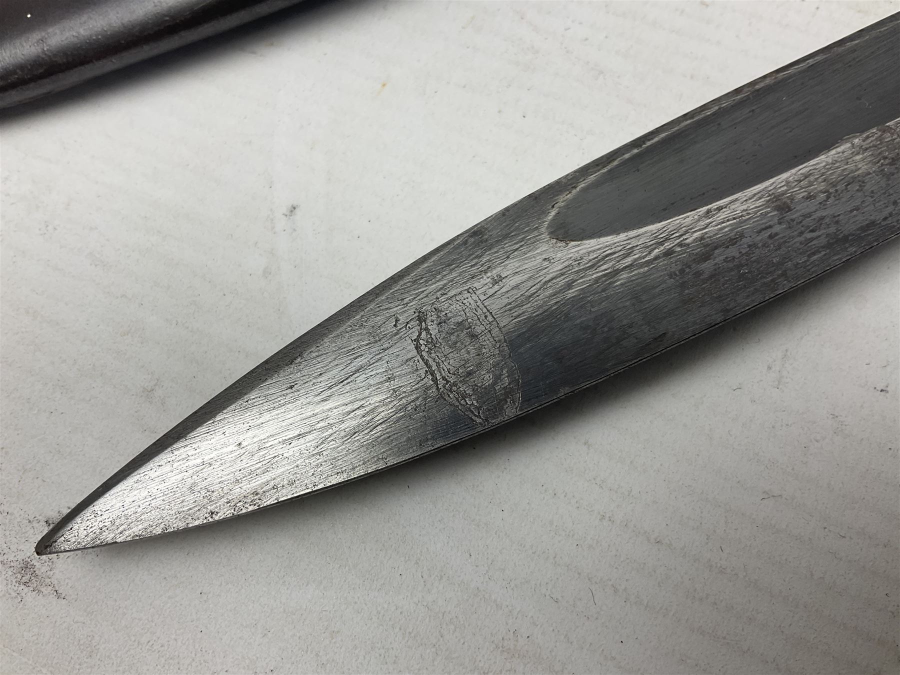 WWII German K98 Mauser bayonet by E. & F. Horster, the 24.5cm fullered blade marked 43aSW for 1943, numerous inspection marks to blade and pommel, bakelite grips and bluing to metal parts; in steel scabbard with corresponding numbers and leather frog L42cm overall