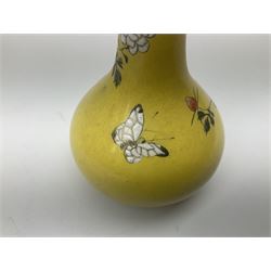Continental Sevres style vase of two-handled urn shaped pedestal form, the gilt and blue ground painted with swags of flowers and Chinese figures H24cm; and Japanese floral decorated yellow glazed bottle vase (2)