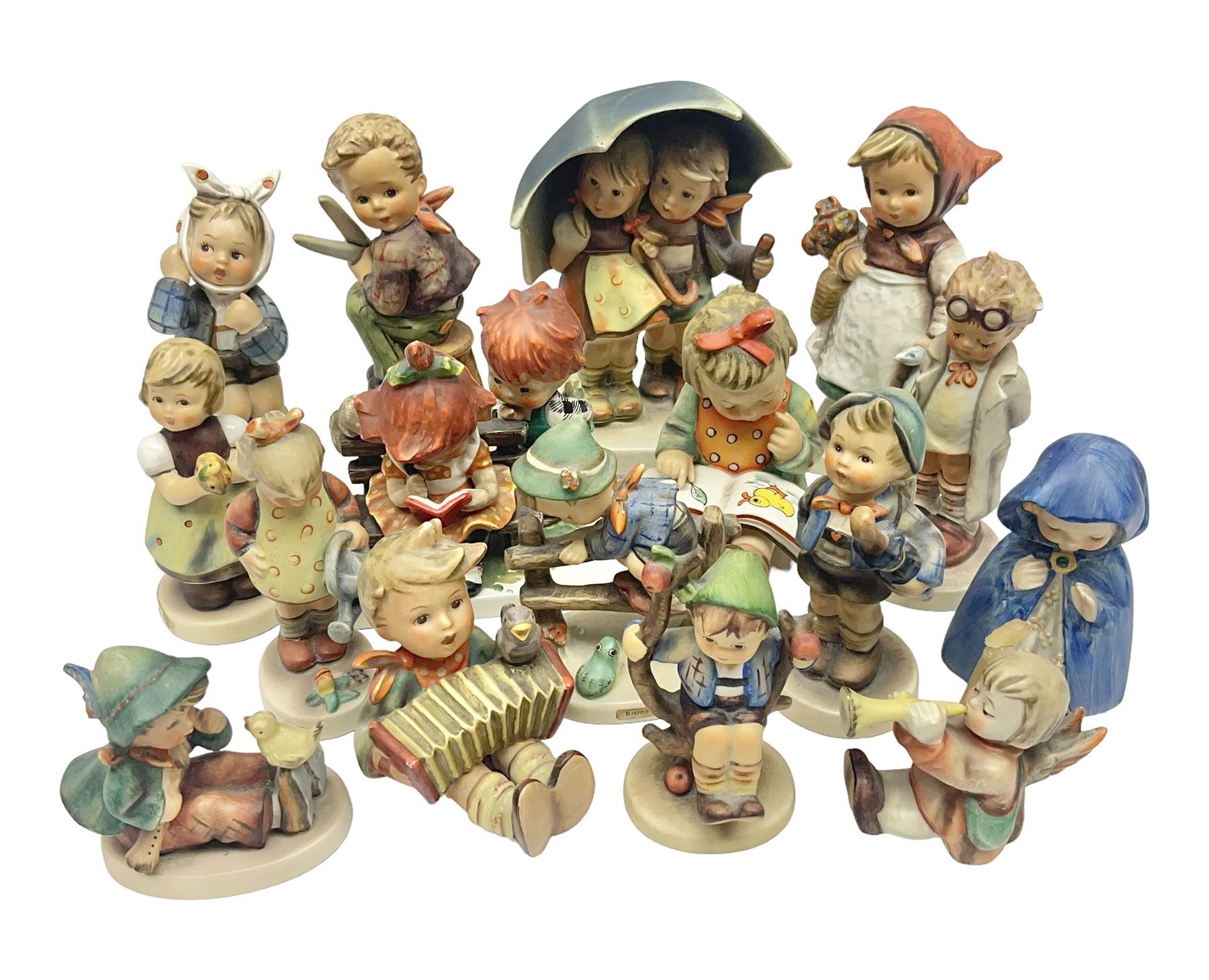 Sixteen Goebel Hummel figures, including Charlot A Young Man's Fancy, Stormy Weather and Bookworm, all with impressed and printed marks beneath