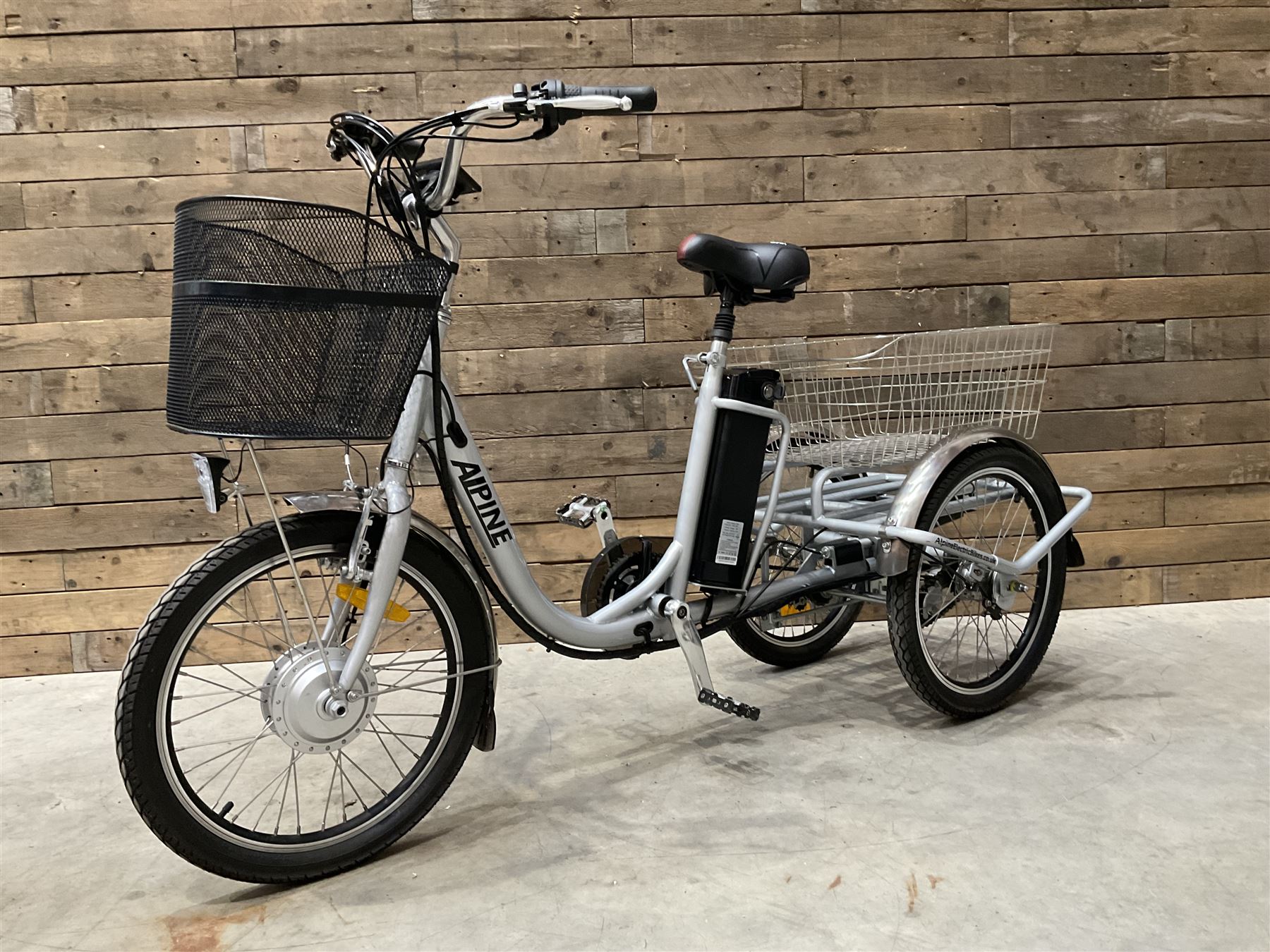 Alpine electric tilt trike - power assisted with throttle (no need to pedal), 15.5mph with 40 mile range, only 37 miles from new, silver finish, removable battery with charger, YoungDo gell seat with cover, £2749 new.