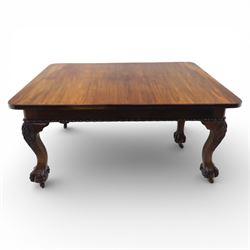 19th century mahogany extending dining table and eight chairs, rectangular top with rounded corners and additional leaves, plain frieze with carved gadrooned edge detail, raised on cabriole supports terminating in ball and claw feet, together with a set of eight mahogany dining chairs including two carvers, the chairs with curved top rails and pierced splats, upholstered drop-in seats, on turned supports

(Table extends to 312cm)