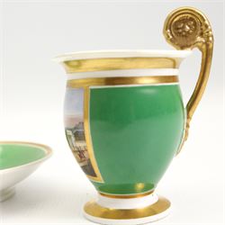 19th century French Empire design porcelain cup and saucer, the cup hand painted with a panel, titled beneath 'Library, St Leonards, Near Hastings', against a green and gilt ground, cup H10.5cm 