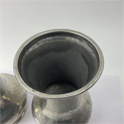 Pair of Liberty & Co Tudric pewter vases, each of bellied form with hammered finish, upon a circular spreading foot, impressed beneath 0987, H12cm